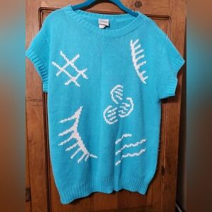 Vintage Teal Sweater measures 21" pit to pit (w-42", length 27")